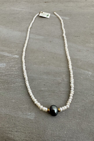 White Pearls Necklace with one Black Pearls