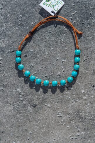 Adjustable bracelet with light blue beads