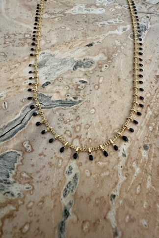 Gold plated chain with black smalto